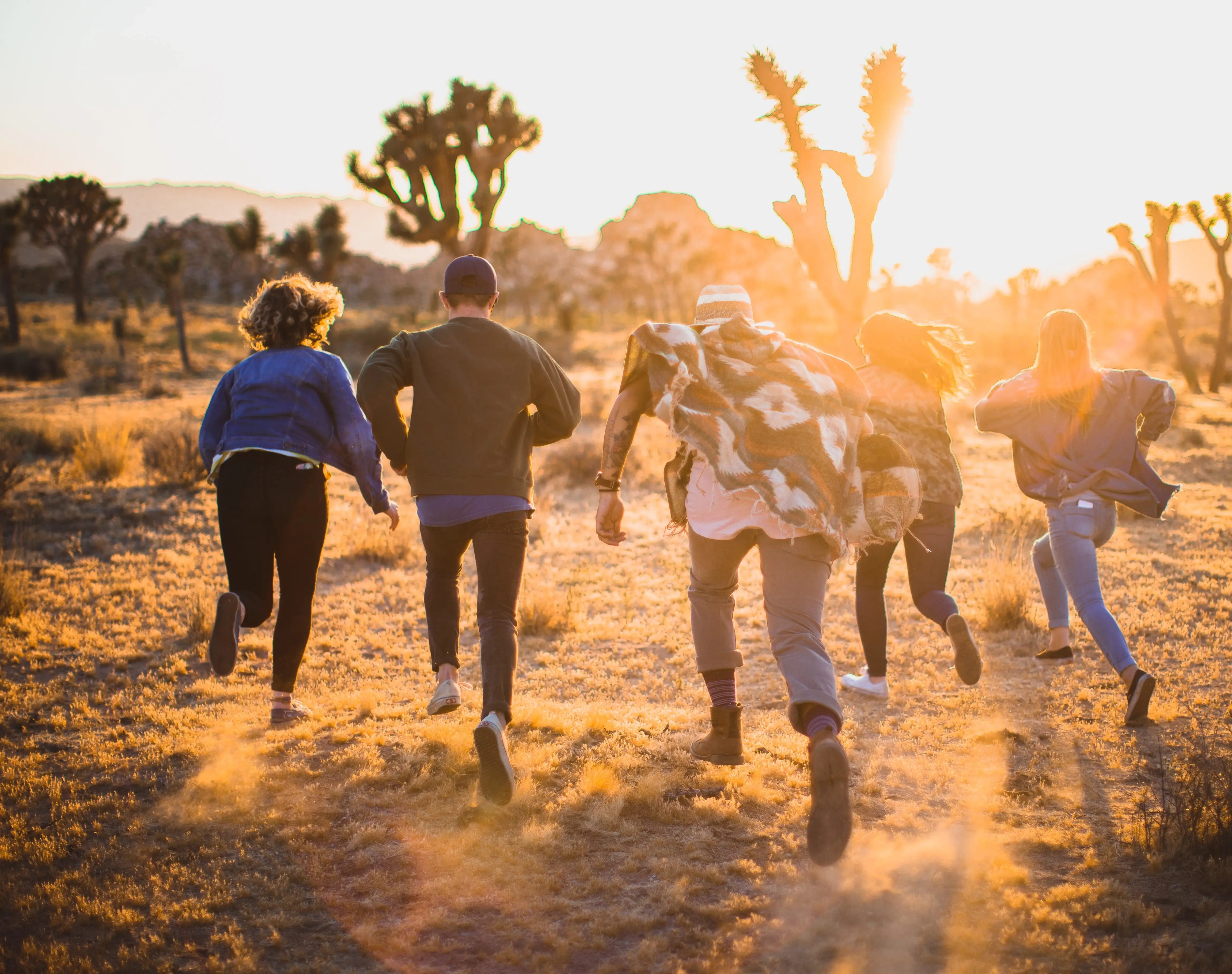 Group of friends enjoying in vibrant landscapes.